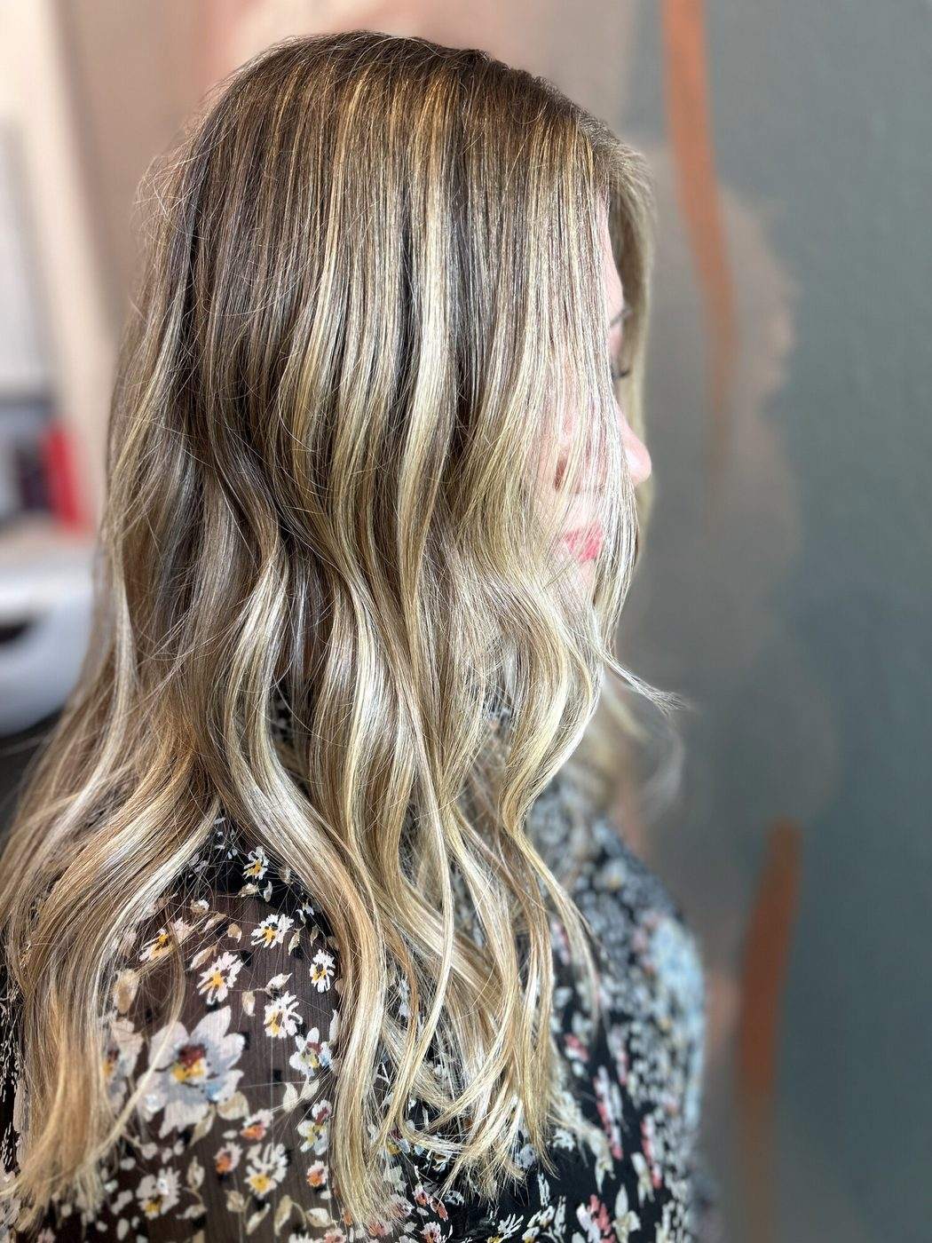 A guest at Grace Filled Hair with hand-painted balayage in soft, natural tones