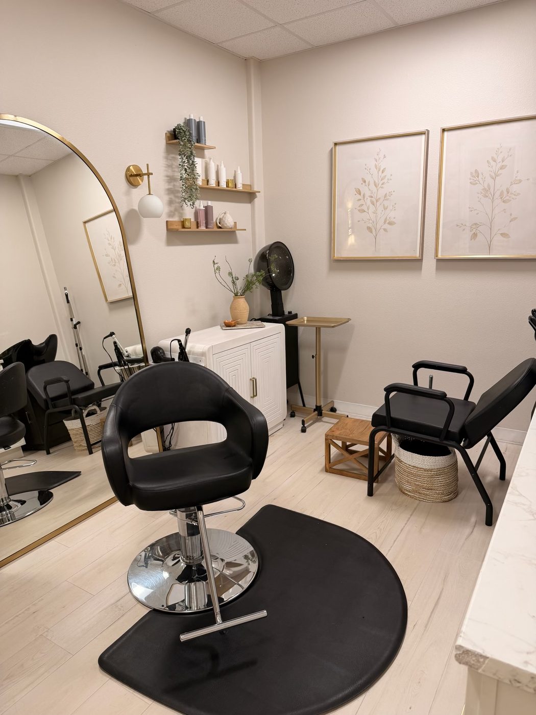 A salon chair set up for an appointment in the private Sarasota suite